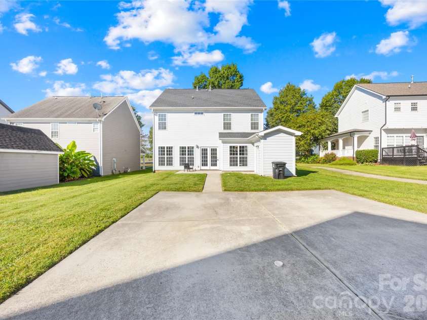 19822 Davidson Concord Road, Davidson, NC 28036.  MLS# CAR4429435, YatesRealty ID 54473. Rear view of home