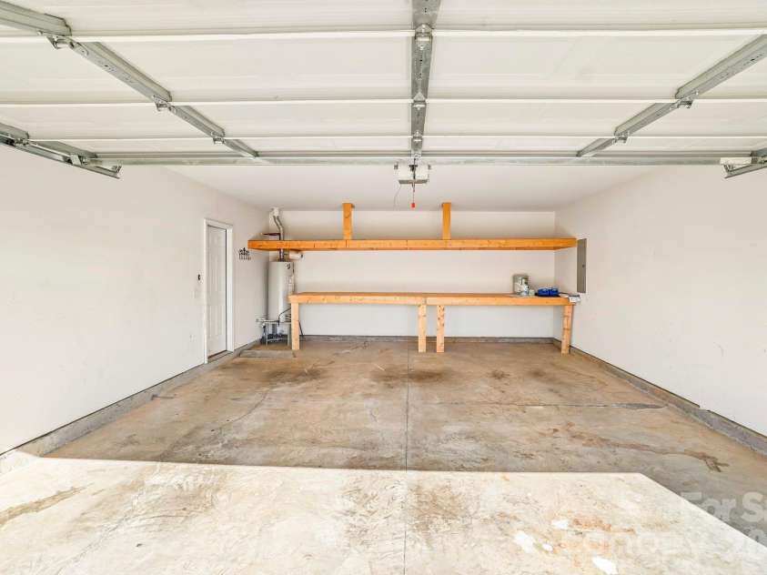 244 Mud Creek Road, Fletcher, NC 28732.  MLS# CAR4429166, YatesRealty ID 54476. 2 Car Garage