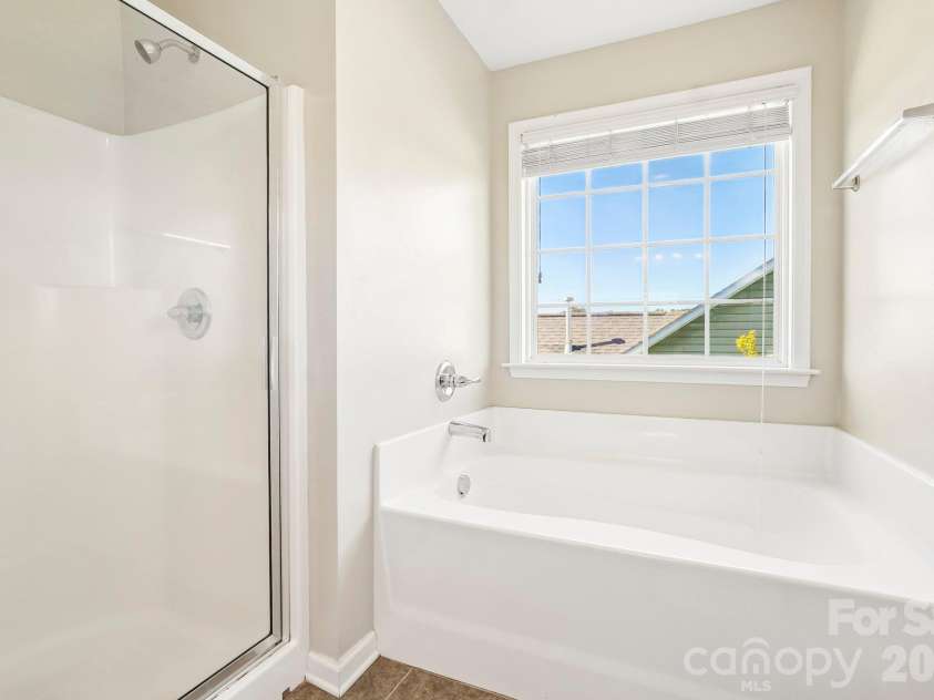 244 Mud Creek Road, Fletcher, NC 28732.  MLS# CAR4429166, YatesRealty ID 54476. Primary Bathroom