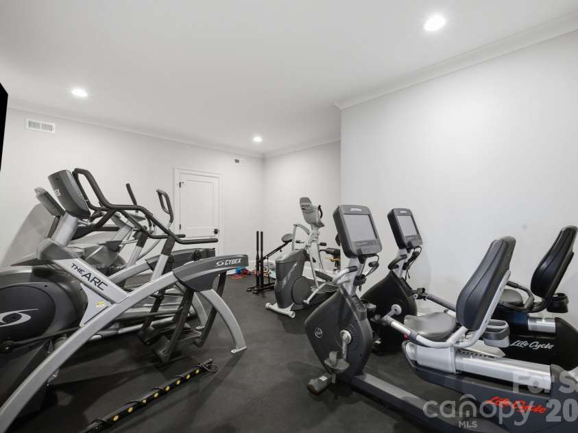 112 Birdsong Lane, Mooresville, NC 28117.  MLS# CAR4430430, YatesRealty ID 54482. Dedicated exercise room located on the lower level.