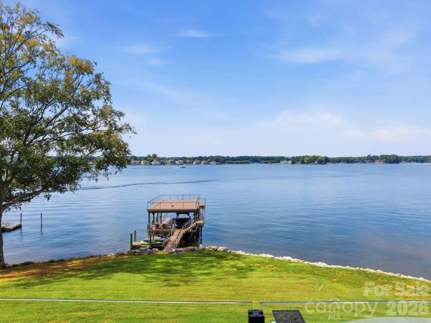 112 Birdsong Lane, Mooresville, NC 28117.  MLS# CAR4430430, YatesRealty ID 54482. Expansive long range lake views.