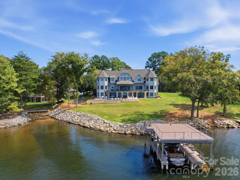 112 Birdsong Lane, Mooresville, NC 28117.  MLS# CAR4430430, YatesRealty ID 54482. Expansive shoreline between both properties.
