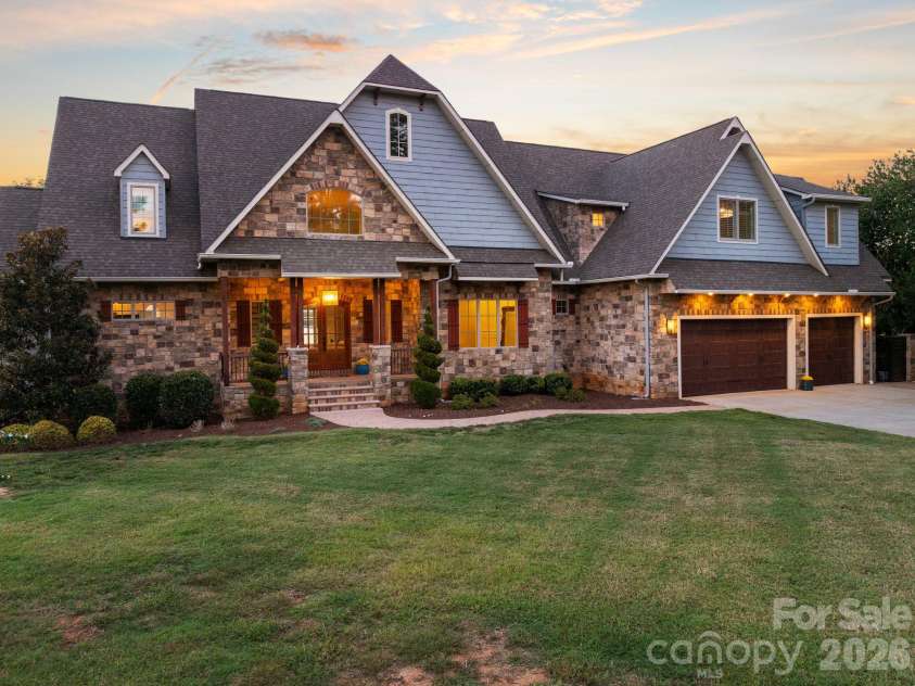 112 Birdsong Lane, Mooresville, NC 28117.  MLS# CAR4430430, YatesRealty ID 54482. Front Exterior - 112 Birdsong Lane