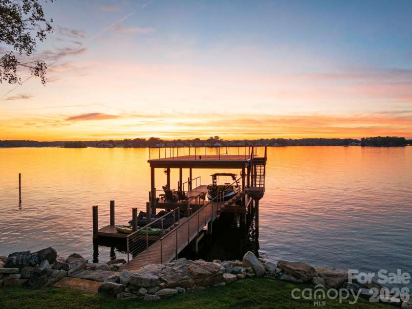 112 Birdsong Lane, Mooresville, NC 28117.  MLS# CAR4430430, YatesRealty ID 54482. Private fixed dock surrounded by breathtaking sunset views.