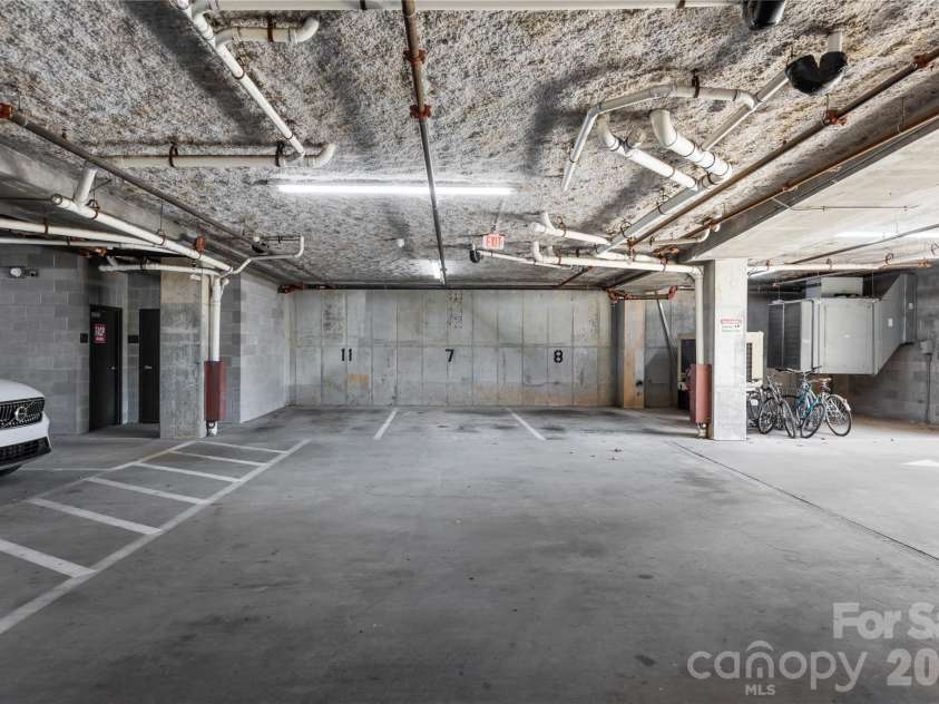 708 Davidson Street, Charlotte, NC 28202.  MLS# CAR4430598, YatesRealty ID 54497. Parking space #7 in the parking deck