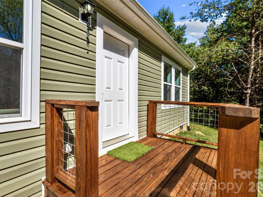 60 Spring Mountain Drive, Canton, NC 28716.  MLS# CAR4419213, YatesRealty ID 54498. Front deck and entry