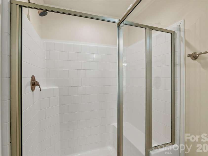 60 Spring Mountain Drive, Canton, NC 28716.  MLS# CAR4419213, YatesRealty ID 54498. Glass walk-in shower