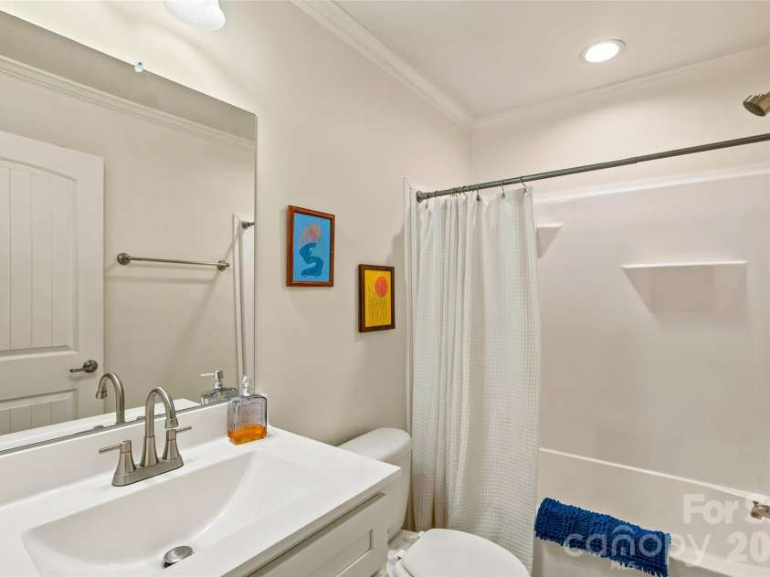 60 Spring Mountain Drive, Canton, NC 28716.  MLS# CAR4419213, YatesRealty ID 54498. Hall bath with tub