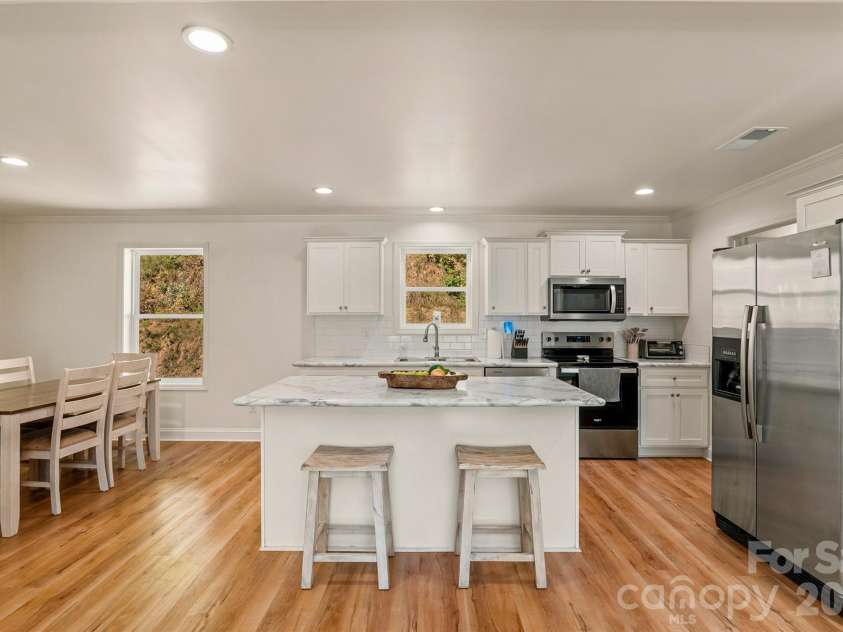 60 Spring Mountain Drive, Canton, NC 28716.  MLS# CAR4419213, YatesRealty ID 54498. Kitchen, dining and living in one room