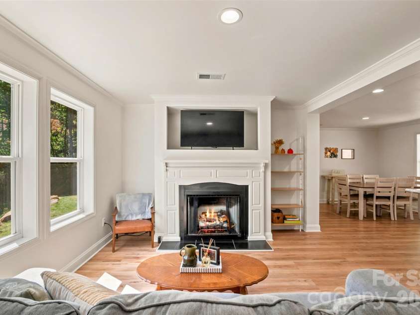 60 Spring Mountain Drive, Canton, NC 28716.  MLS# CAR4419213, YatesRealty ID 54498. Living room with gas fireplace