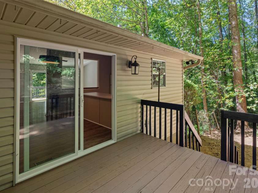 39 Mountain Site Lane, Asheville, NC 28803.  MLS# CAR4430825, YatesRealty ID 54505. Back deck looking out- it's so peaceful
