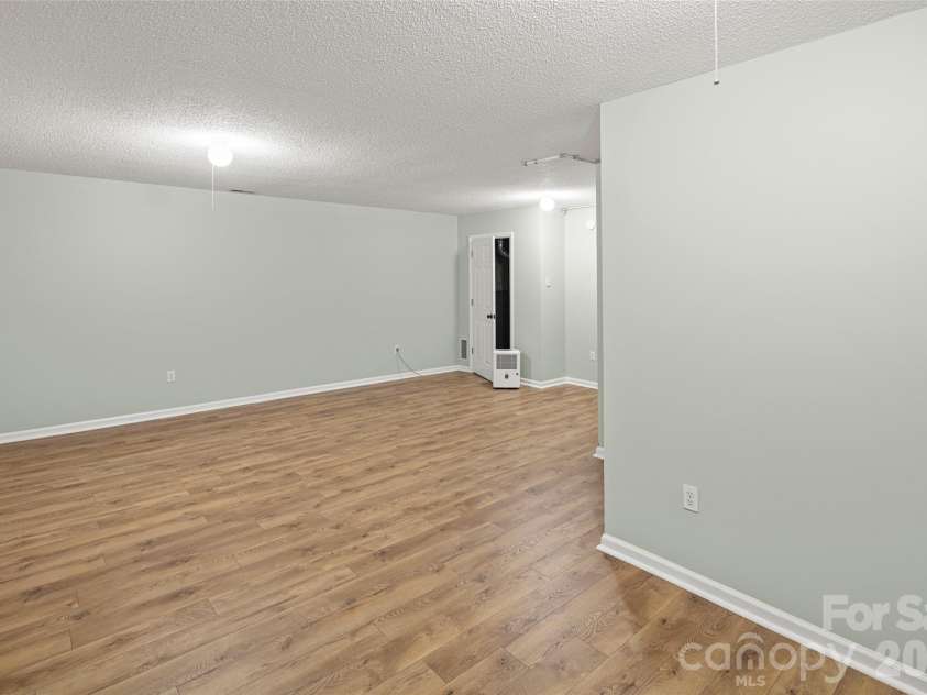 39 Mountain Site Lane, Asheville, NC 28803.  MLS# CAR4430825, YatesRealty ID 54505. Basement is spacious