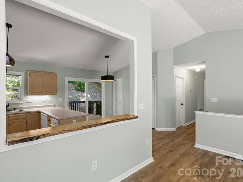 39 Mountain Site Lane, Asheville, NC 28803.  MLS# CAR4430825, YatesRealty ID 54505. Large open space with a live wood countertop