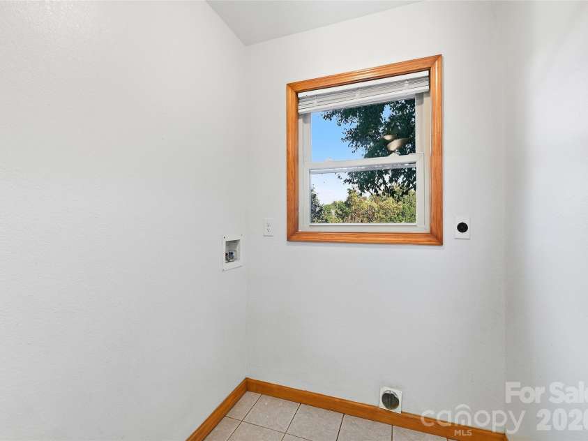144 Appalachian Trail, Maggie Valley, NC 28751.  MLS# CAR4429734, YatesRealty ID 54509. Pantry and Laundry Room