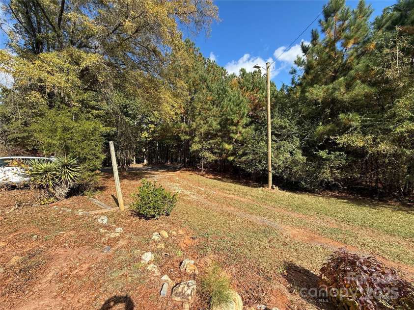 175 Rush Loop Road, Mount Gilead, NC 27306.  MLS# CAR4319543, YatesRealty ID 5451. Front Driveway View