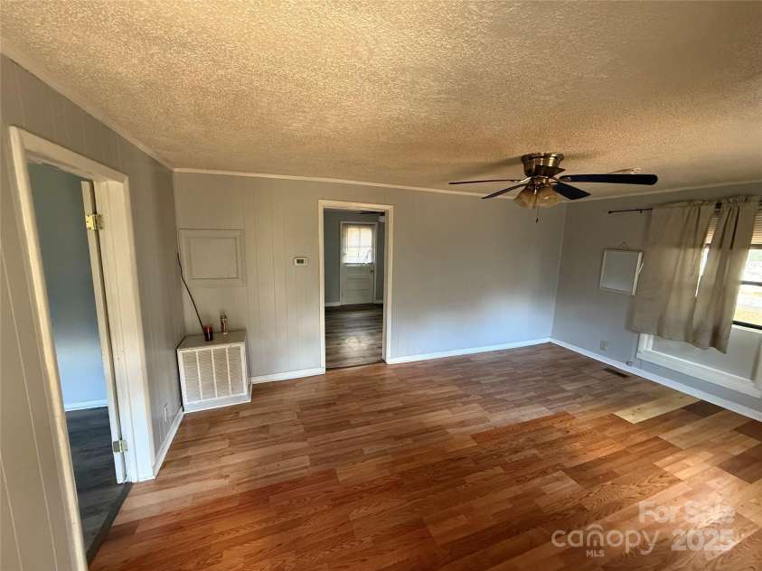 175 Rush Loop Road, Mount Gilead, NC 27306.  MLS# CAR4319543, YatesRealty ID 5451. Living Room