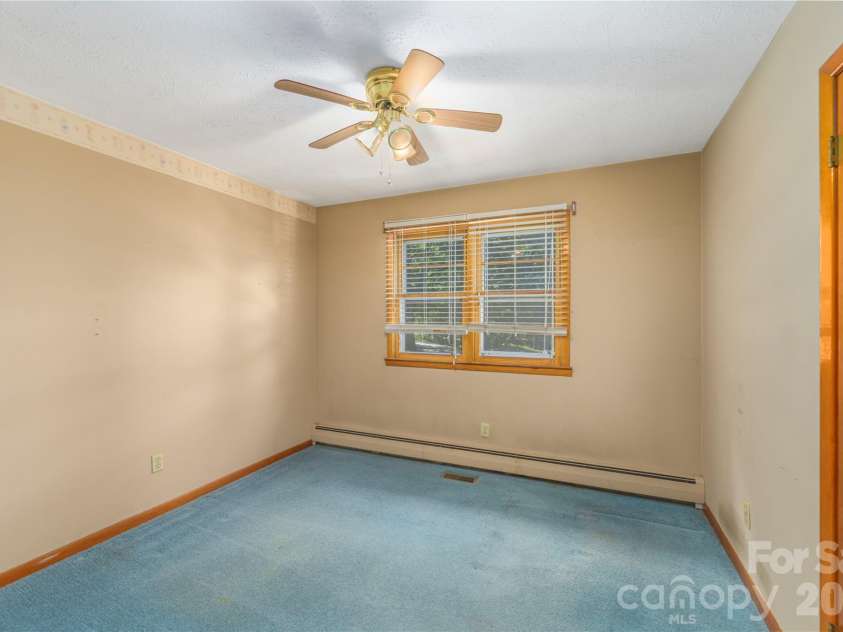 2882 Butler Bridge Road, Mills River, NC 28759.  MLS# CAR4430985, YatesRealty ID 54527. Bedroom Three