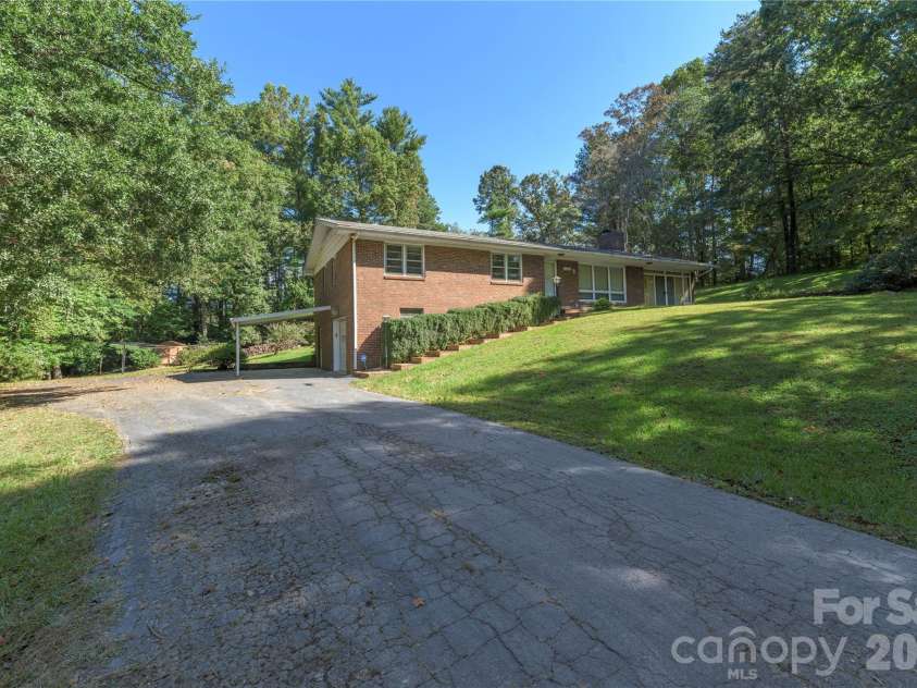 2882 Butler Bridge Road, Mills River, NC 28759.  MLS# CAR4430985, YatesRealty ID 54527. Long paved Driveway