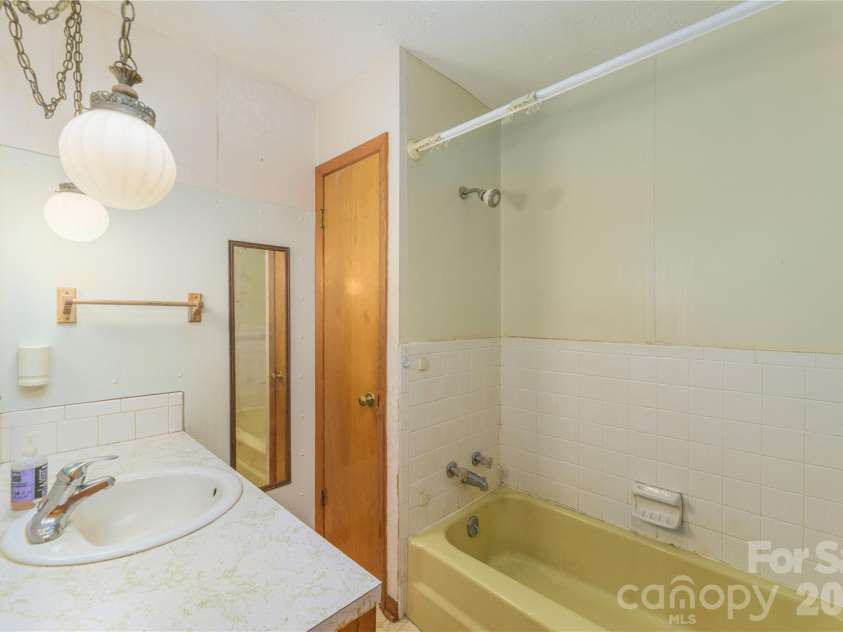 2882 Butler Bridge Road, Mills River, NC 28759.  MLS# CAR4430985, YatesRealty ID 54527. Main Hall Bath