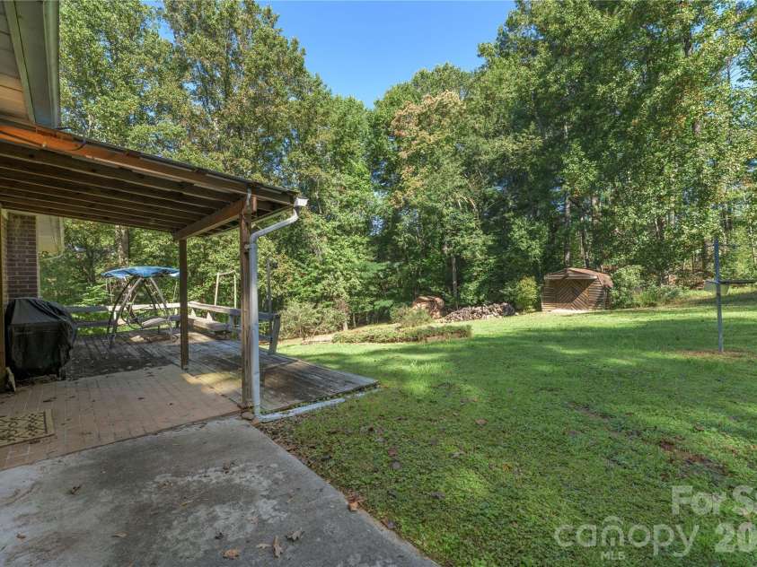 2882 Butler Bridge Road, Mills River, NC 28759.  MLS# CAR4430985, YatesRealty ID 54527. Partial Covered Patio