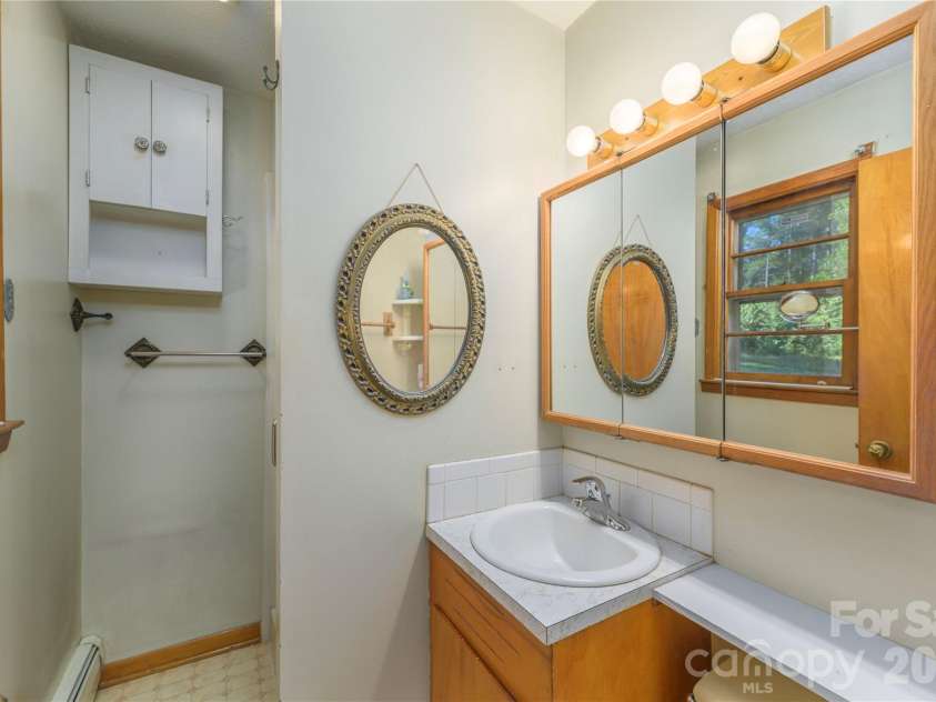 2882 Butler Bridge Road, Mills River, NC 28759.  MLS# CAR4430985, YatesRealty ID 54527. Primary Bath with stand up shower
