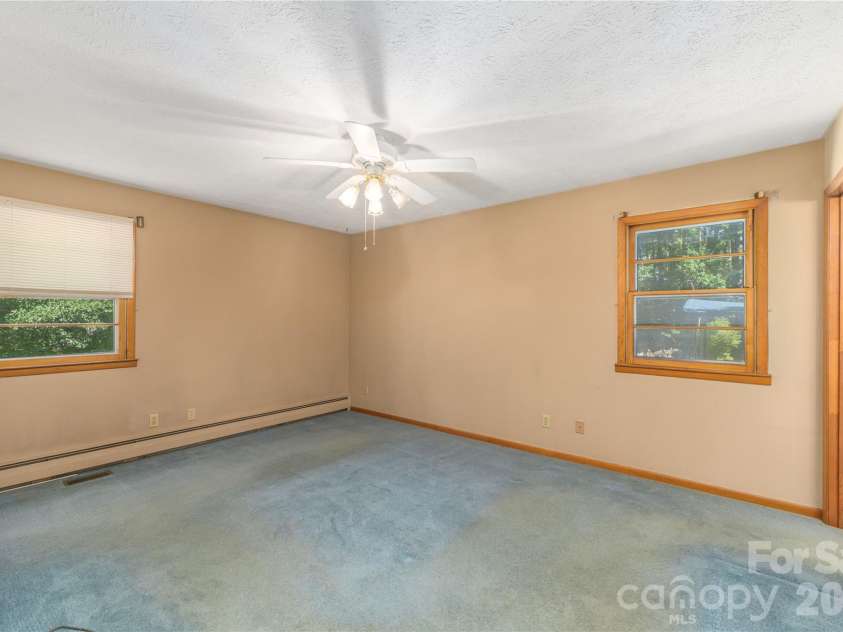 2882 Butler Bridge Road, Mills River, NC 28759.  MLS# CAR4430985, YatesRealty ID 54527. Primary Bedroom
