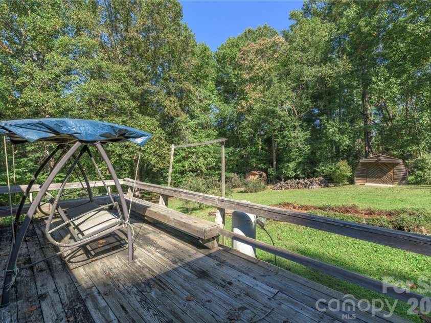 2882 Butler Bridge Road, Mills River, NC 28759.  MLS# CAR4430985, YatesRealty ID 54527. Wooden Deck overlooking Back Yard