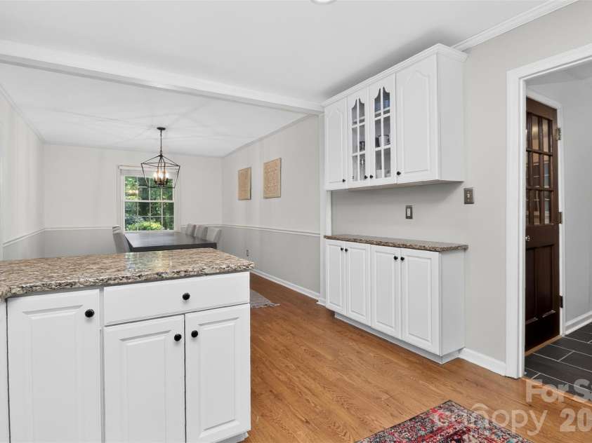 4301 Red Berry Court, Charlotte, NC 28213.  MLS# CAR4430948, YatesRealty ID 54529. Kitchen view towards Dining Room