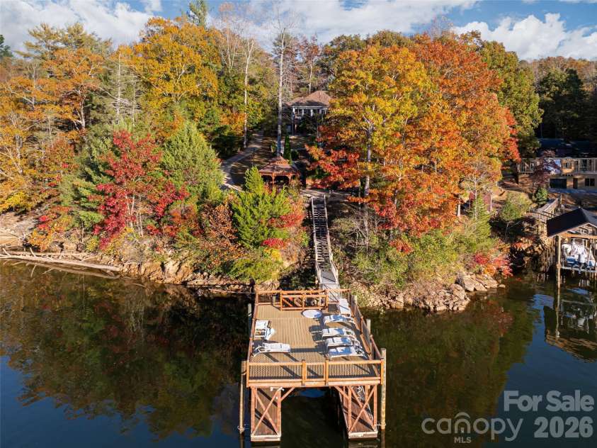 1341 Forest Lake Heights Drive, Nebo, NC 28761.  MLS# CAR4339850, YatesRealty ID 5453. Covered boat dock and large sunning deck above