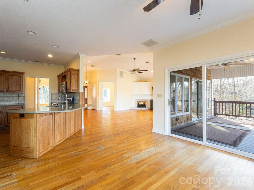 1341 Forest Lake Heights Drive, Nebo, NC 28761.  MLS# CAR4339850, YatesRealty ID 5453. Living/Breakfast looking back toward kitchen and office