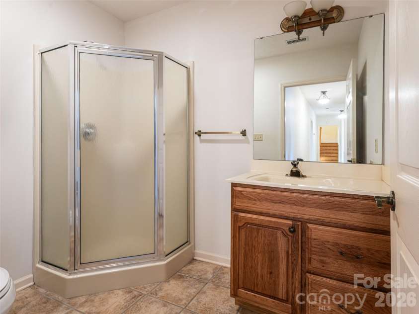 1341 Forest Lake Heights Drive, Nebo, NC 28761.  MLS# CAR4339850, YatesRealty ID 5453. One of two baths on lower level