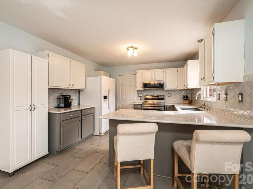 2487 Ashford Drive, Newton, NC 28658.  MLS# CAR4430929, YatesRealty ID 54536. 