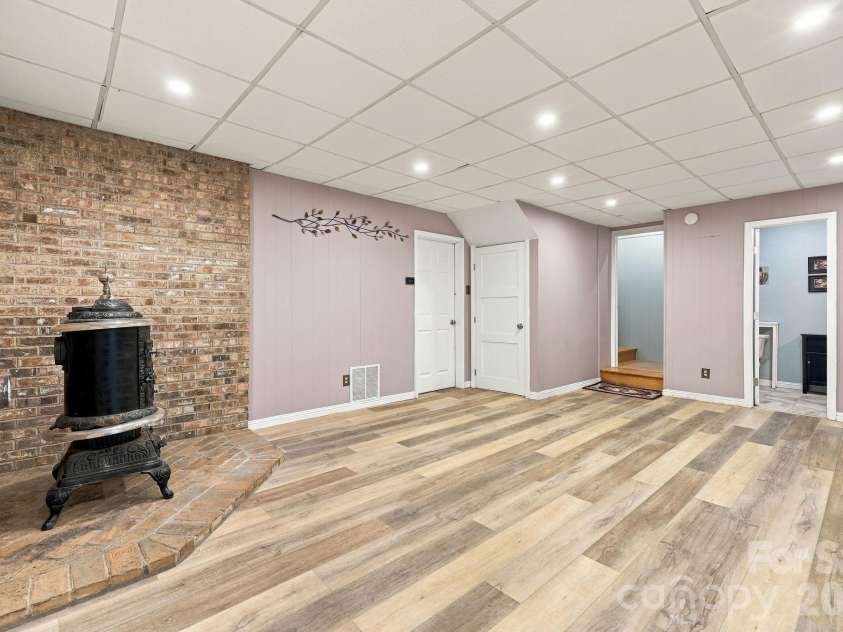14 Cambridge Drive, Candler, NC 28715.  MLS# CAR4431024, YatesRealty ID 54554. Downstairs