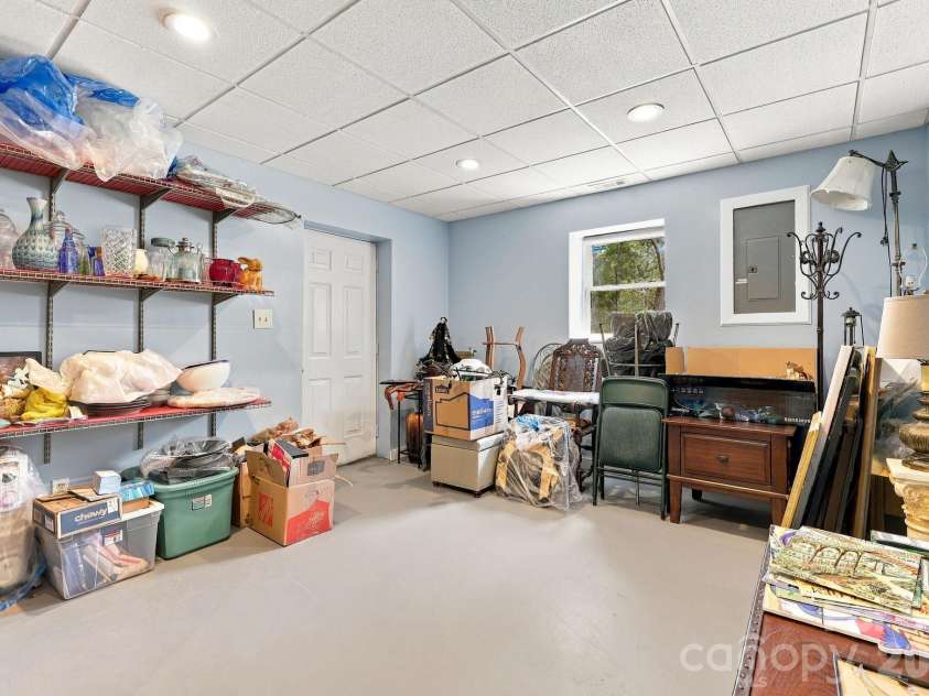 14 Cambridge Drive, Candler, NC 28715.  MLS# CAR4431024, YatesRealty ID 54554. Downstairs