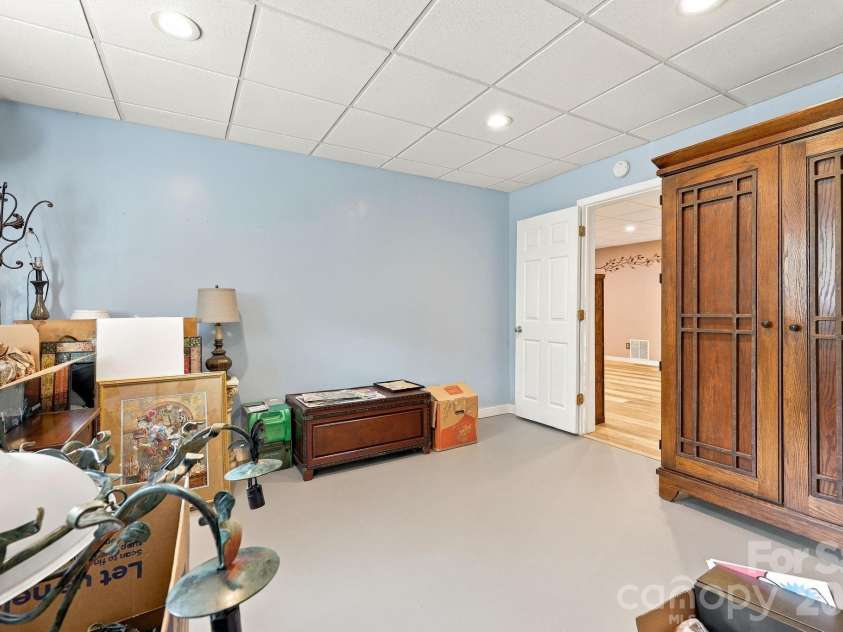14 Cambridge Drive, Candler, NC 28715.  MLS# CAR4431024, YatesRealty ID 54554. Downstairs
