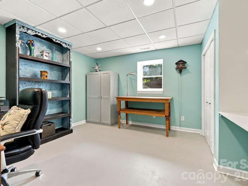 14 Cambridge Drive, Candler, NC 28715.  MLS# CAR4431024, YatesRealty ID 54554. Downstairs