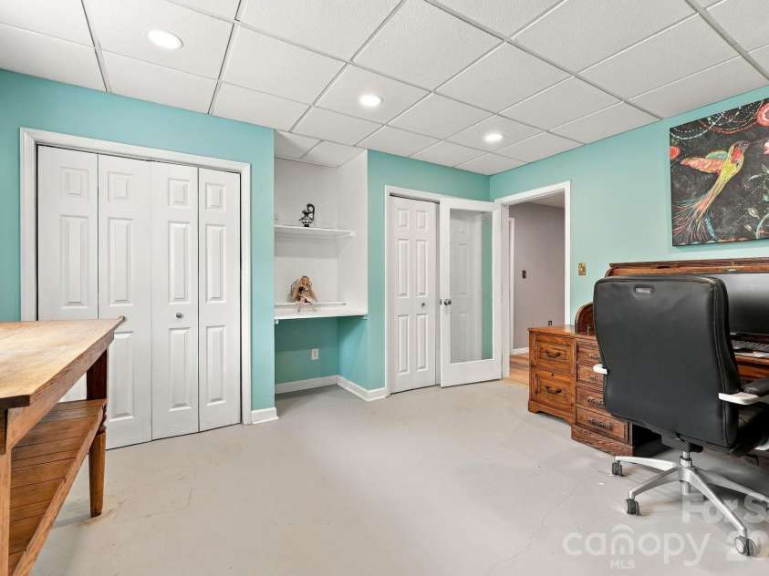14 Cambridge Drive, Candler, NC 28715.  MLS# CAR4431024, YatesRealty ID 54554. Downstairs