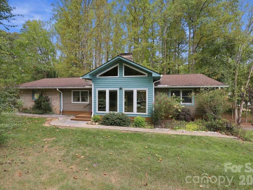 14 Cambridge Drive, Candler, NC 28715.  MLS# CAR4431024, YatesRealty ID 54554. Front view