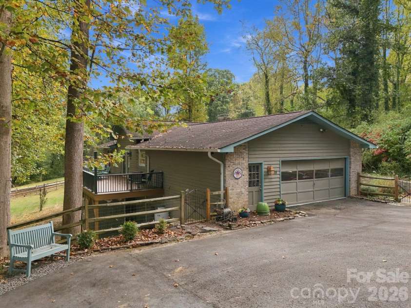 14 Cambridge Drive, Candler, NC 28715.  MLS# CAR4431024, YatesRealty ID 54554. Great Deck and Driveway