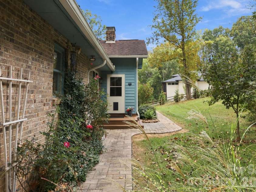 14 Cambridge Drive, Candler, NC 28715.  MLS# CAR4431024, YatesRealty ID 54554. Side entry view