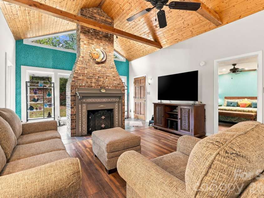 14 Cambridge Drive, Candler, NC 28715.  MLS# CAR4431024, YatesRealty ID 54554. Spacious Open Living Dining Area