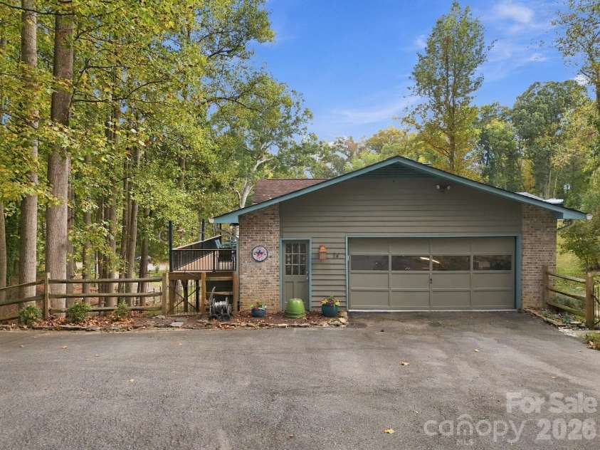 14 Cambridge Drive, Candler, NC 28715.  MLS# CAR4431024, YatesRealty ID 54554. Two Car Garage