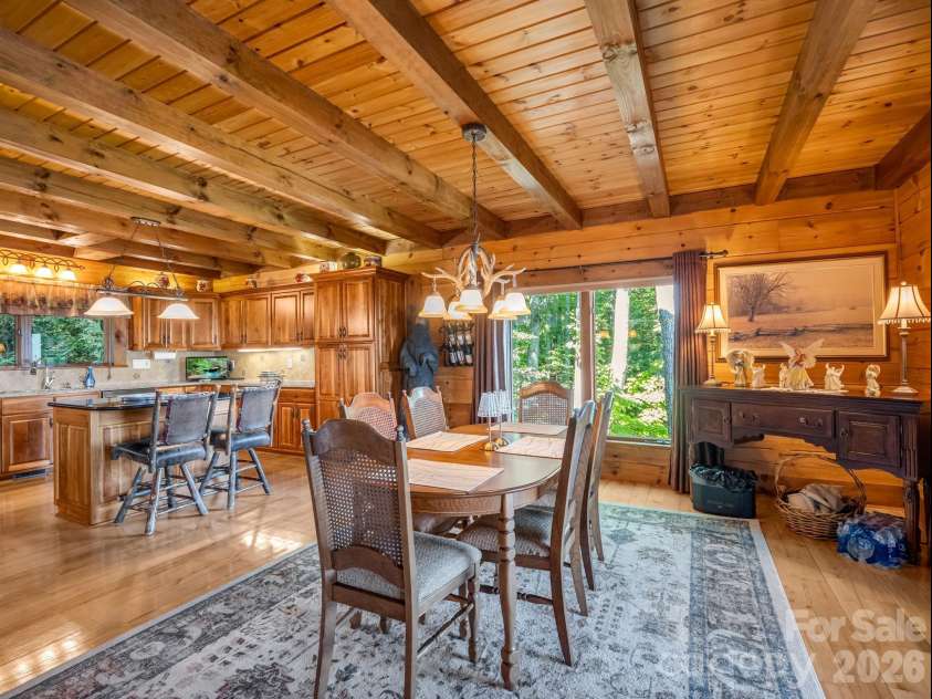5409 Mineral Springs Mountain Avenue, Valdese, NC 28690.  MLS# CAR4426784, YatesRealty ID 54559. Dining room opens to kitchen and large deck