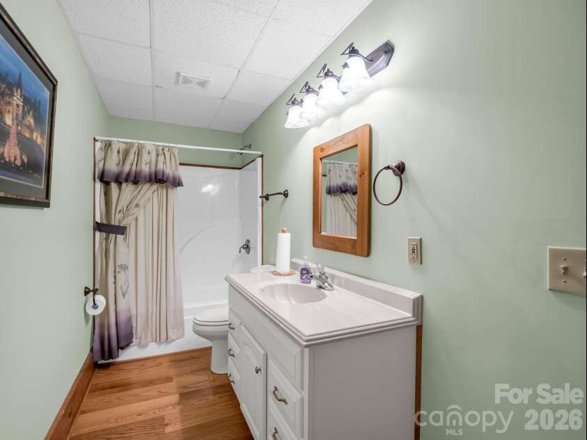 5409 Mineral Springs Mountain Avenue, Valdese, NC 28690.  MLS# CAR4426784, YatesRealty ID 54559. Full bath off bedroom lower level