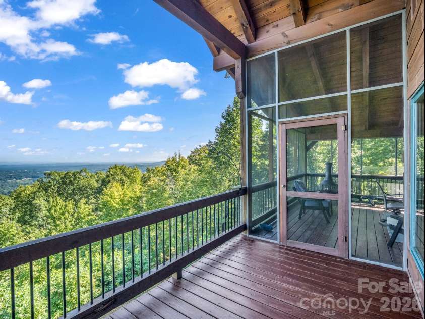 5409 Mineral Springs Mountain Avenue, Valdese, NC 28690.  MLS# CAR4426784, YatesRealty ID 54559. Main level deck and screen porch entry