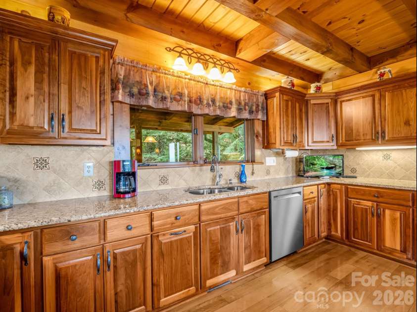 5409 Mineral Springs Mountain Avenue, Valdese, NC 28690.  MLS# CAR4426784, YatesRealty ID 54559. Walnut custom cabintery