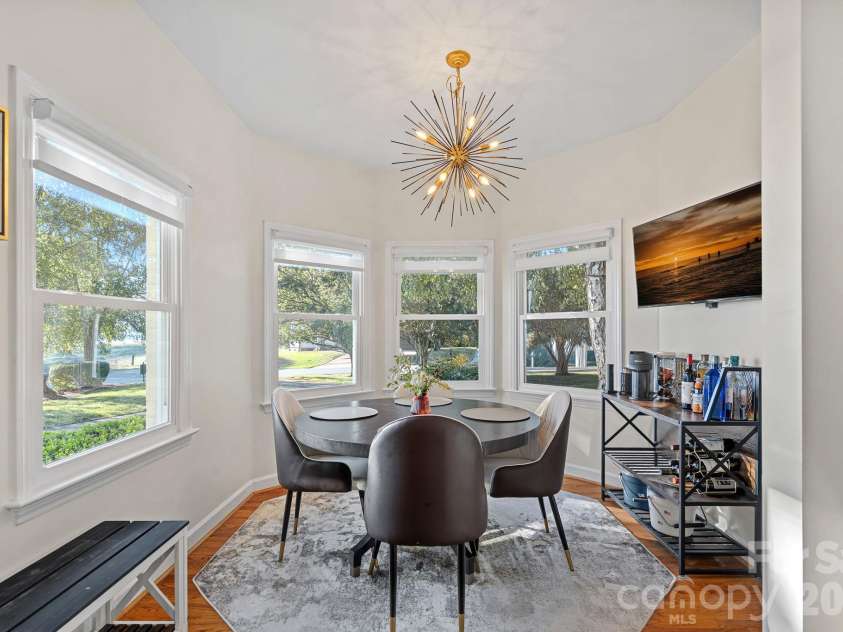 8049 Ravenwood Lane, Stanley, NC 28164.  MLS# CAR4426461, YatesRealty ID 54579. Breakfast room off kitchen with lake view