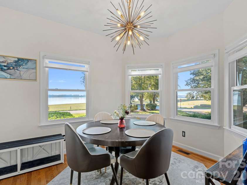 8049 Ravenwood Lane, Stanley, NC 28164.  MLS# CAR4426461, YatesRealty ID 54579. Breakfast room off kitchen with lake view