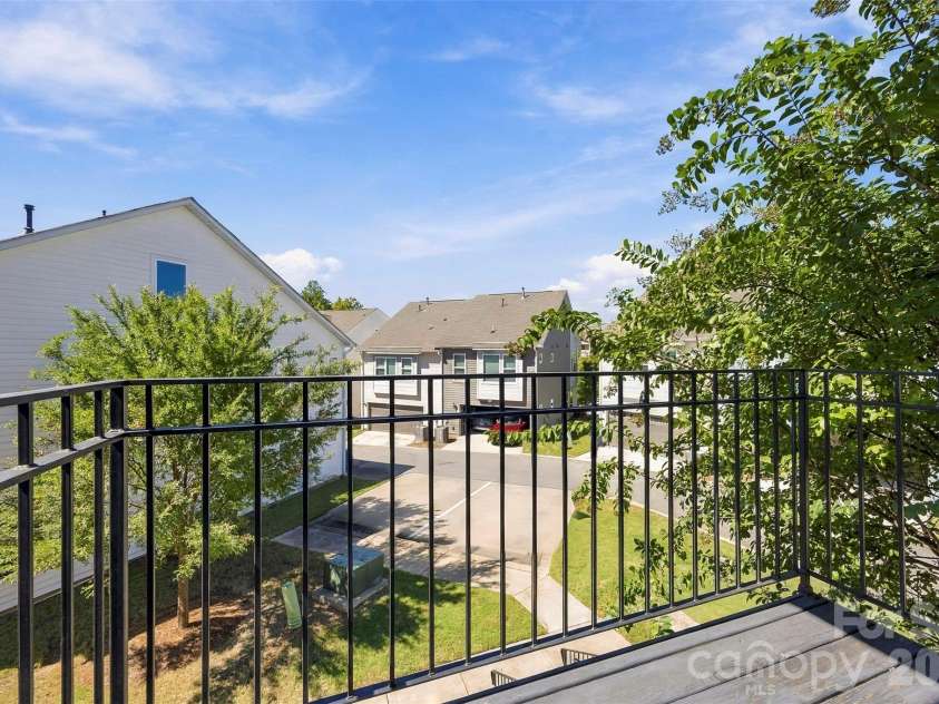 1432 Winding Stream Road, Charlotte, NC 28206.  MLS# CAR4428731, YatesRealty ID 54580. Living Room Balcony