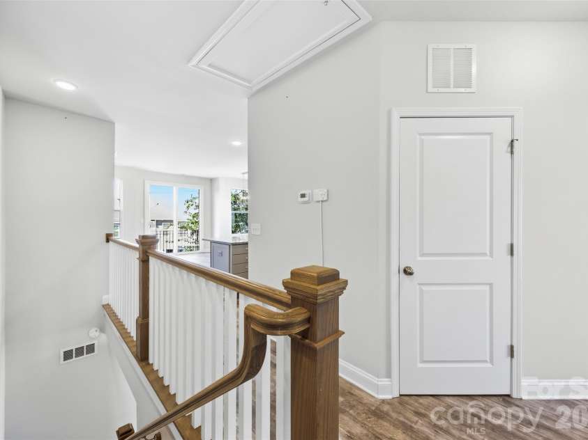 1432 Winding Stream Road, Charlotte, NC 28206.  MLS# CAR4428731, YatesRealty ID 54580. Upper Level Hallway & Laundry